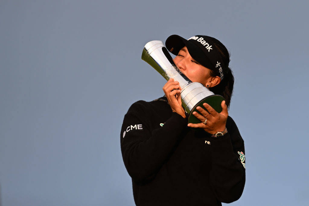 Champion, Lydia Ko of New Zealand kisses the AIG Women's Open trophy following victory on Day Four of the AIG Women's Open